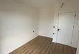 Dostępny zakup Nowoczesny apartament z dwiema sypialniami i widokiem na góry w kompleksie mieszkalnym na poziomie hotelu, Mahmutlar - Alanya 9