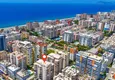 Kupić Dwupoziomowy penthouse 4+1 z widokiem na góry i morze — Alanya, dzielnica Mahmutlar  1 