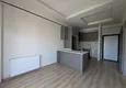 Dostępny zakup Mieszkanie 1+1 z widokiem na morze zaledwie 300 metrów od morza - Mersin, dzielnica Tomuk 1