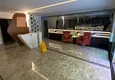 Kupić Umeblowane mieszkanie 1+1 z widokiem na morze w luksusowym kompleksie - Kargycak, pierwsza linia brzegowa 17