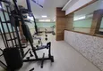 Kupić Kompaktowy apartament pod klucz z przeszklonym balkonem 400 metrów od morza - Alanya, dzielnica Oba 13
