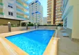 Kupić Umeblowane mieszkanie z dwiema sypialniami w przytulnym kompleksie - Mahmutlar, Alanya 1