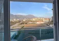 Dostępny zakup Dwupokojowy apartament z meblami i widokiem na góry w komfortowym kompleksie — Mahmutlar, Alanya 15