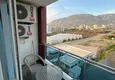 Dostępny zakup Dwupokojowy apartament z meblami i widokiem na góry w komfortowym kompleksie — Mahmutlar, Alanya 16