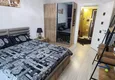 Dostępny zakup Dwupokojowy apartament z meblami i widokiem na góry w komfortowym kompleksie — Mahmutlar, Alanya 9