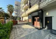 Kupić Umeblowany apartament z dwiema sypialniami w centrum Mahmutlar, zaledwie 200 metrów od plaży 12