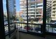 Dostępny zakup Umeblowany apartament z dwiema sypialniami w centrum Mahmutlar, zaledwie 200 metrów od plaży 30