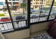 Dostępny zakup Umeblowany apartament z dwiema sypialniami w centrum Mahmutlar, zaledwie 200 metrów od plaży 31