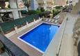 Dostępny zakup Umeblowany apartament z dwiema sypialniami w centrum Mahmutlar, zaledwie 200 metrów od plaży 32