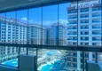 Dostępny zakup Jednopokojowy apartament pod klucz z dwoma przeszklonymi balkonami w prestiżowym kompleksie - Mahmutlar, Alanya 14