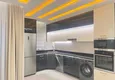 Dostępny zakup Jednopokojowy apartament pod klucz z dwoma przeszklonymi balkonami w prestiżowym kompleksie - Mahmutlar, Alanya 3