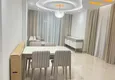Dostępny zakup Jednopokojowy apartament pod klucz z dwoma przeszklonymi balkonami w prestiżowym kompleksie - Mahmutlar, Alanya 4