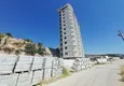 Kupić Apartament 1+1 z widokiem na morze i górę Ich Kale w Alanyi, Mahmutlar — sprzedaż od właściciela 4