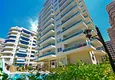 Kupić Dwupoziomowy penthouse 2+1 z meblami i widokiem na morze w centrum Mahmutlar 1