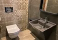 Kupić Apartament 2+1 przy plaży w Mahmutlar — wersja gotowa z widokiem na morze 24 