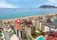 Kupić Mieszkanie 2+1 na zezwolenie na pobyt w dzielnicy Alanya — Oba, pierwsza linia brzegowa 2 