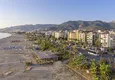 Kupić Mieszkanie 2+1 na zezwolenie na pobyt w dzielnicy Alanya — Oba, pierwsza linia brzegowa 3 