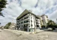 Kupić 1+1 apartamenty z doskonałym wykończeniem w centrum Alanyi, plaża Kleopatra 1