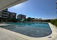 Kupić Apartament 1+1 w centrum Mahmutlar — nowoczesny komfort i panoramiczne widoki 3