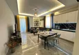 Dostępny zakup Apartament 1+1 w centrum Mahmutlar — nowoczesny komfort i panoramiczne widoki 5