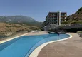 Kupić Apartament 2+1 z panoramicznym widokiem na morze i przyrodę w Mahmutlar — w kompleksie premium 8