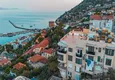 Kupić Apartament 3+1 na zezwolenie na pobyt w Alanyi, dzielnica Kale - umeblowany i z panoramicznym widokiem na morze i port  1 