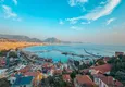 Dostępny zakup Apartament 3+1 na zezwolenie na pobyt w Alanyi, dzielnica Kale - umeblowany i z panoramicznym widokiem na morze i port  49 