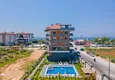 Kupić 1+1 umeblowane mieszkanie w Alanya, Kestel - 150 m do morza, przeszklony balkon  3 