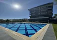 Kupić 1+1 umeblowane mieszkanie w Alanya, Kestel - 150 m do morza, przeszklony balkon  6 