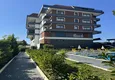 Kupić 1+1 umeblowane mieszkanie w Alanya, Kestel - 150 m do morza, przeszklony balkon  7 