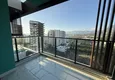 Dostępny zakup Dobra cena! Apartament 1+1 w Mahmutlar — obiekt na podstawie zezwolenia na pobyt z widokiem na góry 13