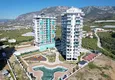 Kupić Dobra cena! Apartament 1+1 w Mahmutlar — obiekt na podstawie zezwolenia na pobyt z widokiem na góry 1
