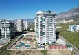 Kupić Dobra cena! Apartament 1+1 w Mahmutlar — obiekt na podstawie zezwolenia na pobyt z widokiem na góry 3