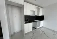 Dostępny zakup Dobra cena! Apartament 1+1 w Mahmutlar — obiekt na podstawie zezwolenia na pobyt z widokiem na góry 3