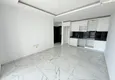 Dostępny zakup Dobra cena! Apartament 1+1 w Mahmutlar — obiekt na podstawie zezwolenia na pobyt z widokiem na góry 6
