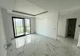 Dostępny zakup Dobra cena! Apartament 1+1 w Mahmutlar — obiekt na podstawie zezwolenia na pobyt z widokiem na góry 7