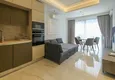 Dostępny zakup Apartament 1+1 przy plaży w Mahmutlar — umeblowany i z panoramicznym widokiem na morze 1