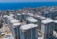 Kupić Elitarny dwupiętrowy penthouse 4+1 z widokiem na morze i fortecę - centrum Mahmutlar 1