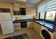 Dostępny zakup Wykończony apartament z dwiema sypialniami w kompleksie w budowie w Mahmutlar 10