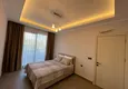 Dostępny zakup Wykończony apartament z dwiema sypialniami w kompleksie w budowie w Mahmutlar 12