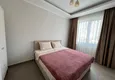 Dostępny zakup Wykończony apartament z dwiema sypialniami w kompleksie w budowie w Mahmutlar 15