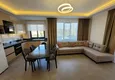Dostępny zakup Wykończony apartament z dwiema sypialniami w kompleksie w budowie w Mahmutlar 3