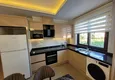 Dostępny zakup Wykończony apartament z dwiema sypialniami w kompleksie w budowie w Mahmutlar 9