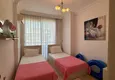 Dostępny zakup Umeblowany apartament 3+1 z widokiem na morze w centrum Mahmutlar 10