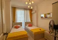 Dostępny zakup Umeblowany apartament 3+1 z widokiem na morze w centrum Mahmutlar 9