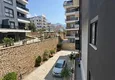 Dostępny zakup Nieumeblowane mieszkanie z jedną sypialnią w Oba, Alanya 8
