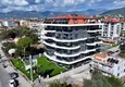 Kupić Apartament 1+1 z widokiem na morze i fortecę przy plaży w Kestel 10