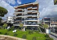 Kupić Apartament 1+1 z widokiem na morze i fortecę przy plaży w Kestel 13