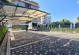 Kupić Apartament 1+1 z widokiem na morze i fortecę przy plaży w Kestel 24