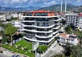 Kupić Apartament 1+1 z widokiem na morze i fortecę przy plaży w Kestel 2
